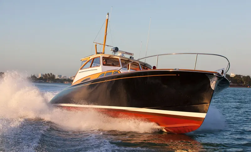 Vendetta running off Miami, the 56-foot commuter Doug Zurn drew for Billy Joel in 2005, a 1920s torpedo-boat stern built to carry 2,600 horsepower to 47 knots.