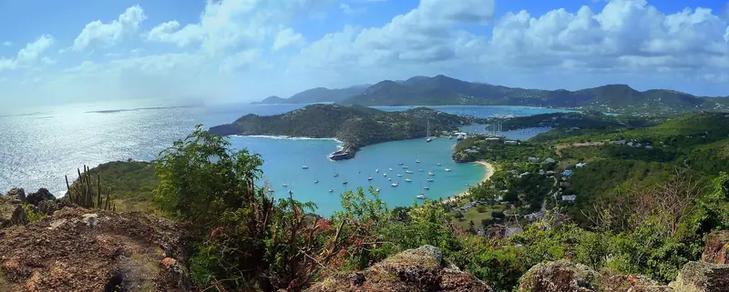 The full sweep of English and Falmouth Harbours from Shirley Heights, the ridge where the well-known Sunday sunset party has run for decades.