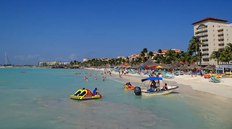 Eagle Beach's shallow, wind-flattened water off the resort strip, exactly the anchorage conditions a tender or shallow-draft launch can work close to shore.