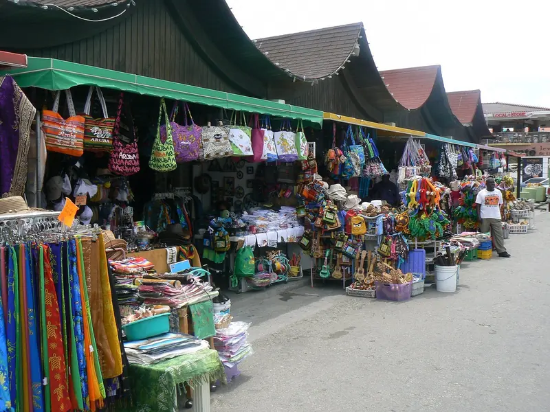 The covered craft market on Oranjestad's harbourfront, a short walk from the marina and the usual first stop for crew provisioning ashore.