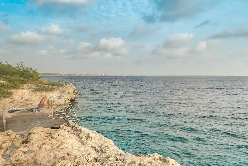 Oilslick Leap, a shore dive site on Curacao's rugged ironshore coast.