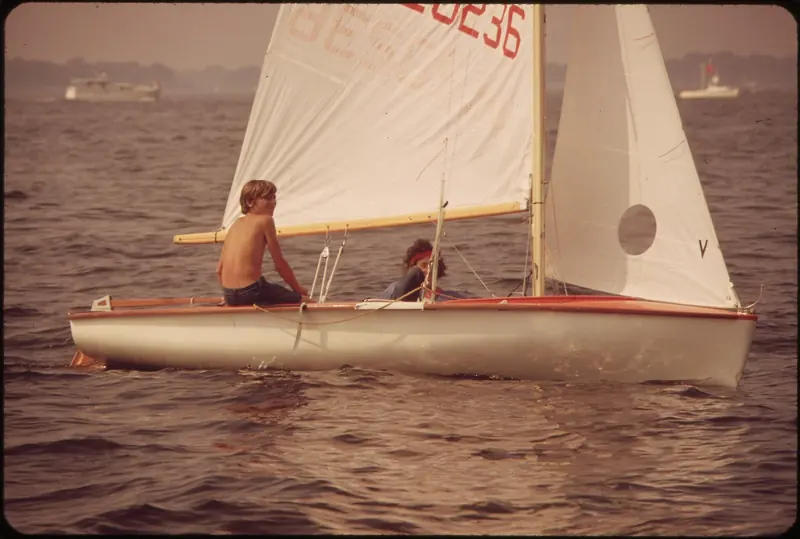 A small sailing dinghy on the Chesapeake, the kind of boat generations of Annapolis sailors first learned on.