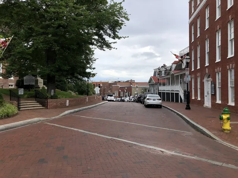 A brick street in historic downtown Annapolis, a short walk from City Dock and Ego Alley.