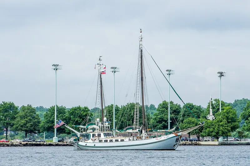 A schooner moored in Annapolis Harbor at dusk.