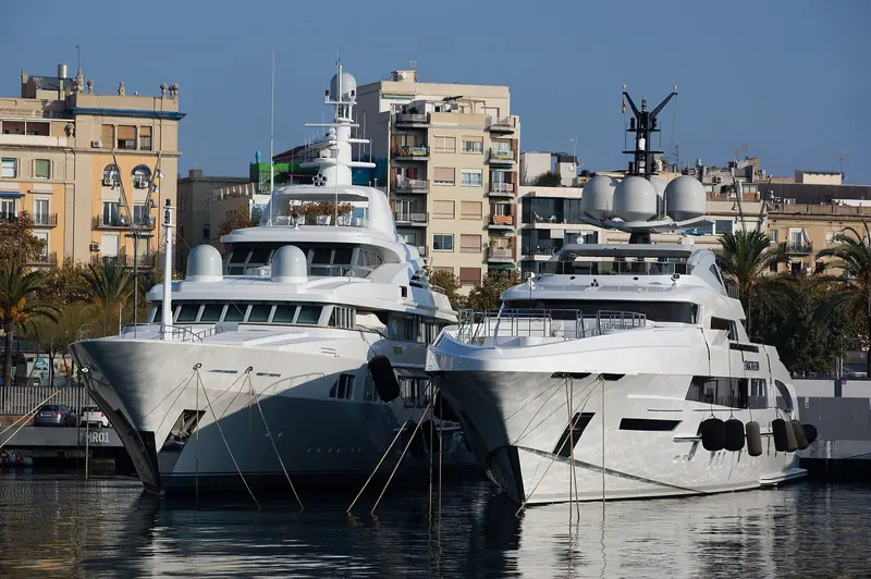 Large motor yachts lie in Port Vell in the middle of Barcelona, at a marina whose dedicated superyacht quay runs 440 metres.