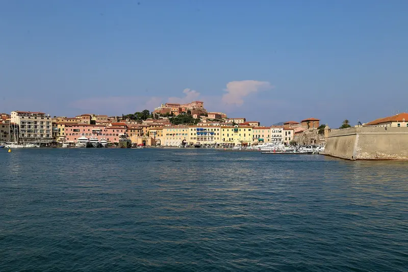 Portoferraio's Darsena Medicea, the old Medici inner harbour that still holds the town's boats today. Napoleon governed the island from the hill directly above this water in 1814 and 1815.
