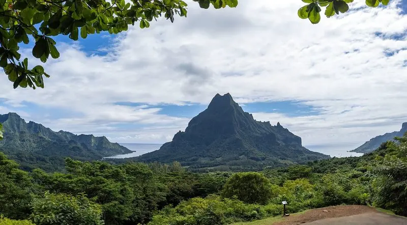 Mount Rotui stands between the two long bays that cut into the north coast of Moorea, each deep, well walled in and open to the sea at its mouth.