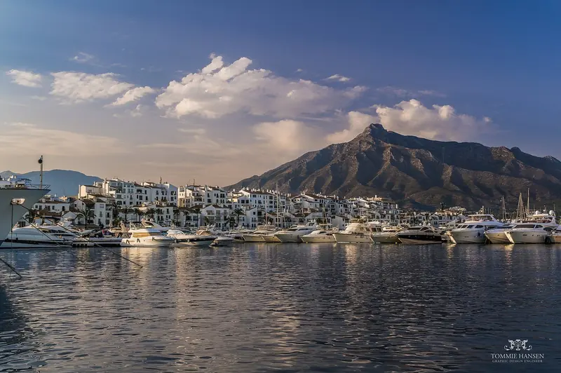 Puerto Banus from the water at the end of the day, the social address of a coast whose berthing ceiling is now met at Malaga instead.