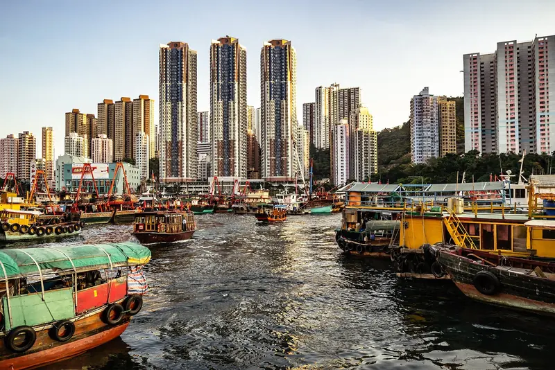 Aberdeen Harbour's typhoon-shelter moorings, packed tight beneath the high-rise towers of Wong Chuk Hang, show how little open water space the south side of the island actually has.