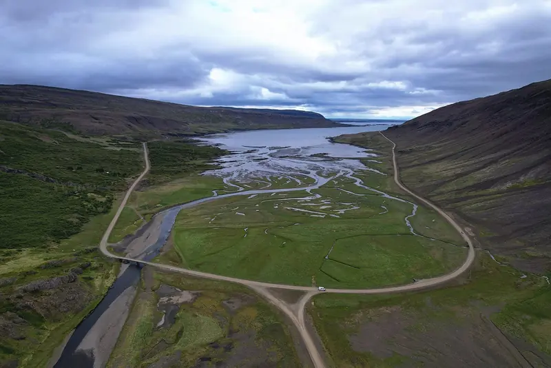 A braided river delta meets the sea in a west fjord, the kind of glacially carved inlet that makes the west coast slow, spectacular and short of shelter in a blow.