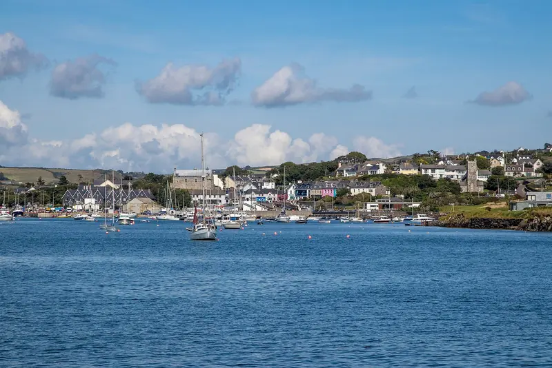 Baltimore, County Cork, with yachts on moorings off the town and the harbour castle behind