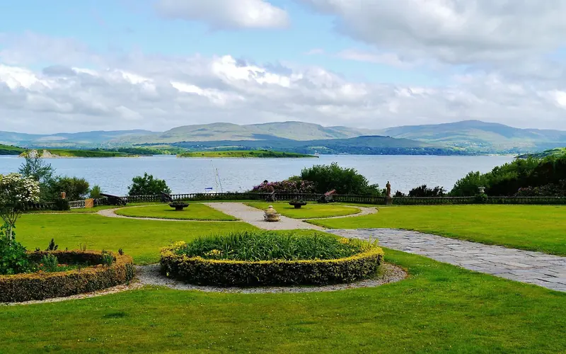 Bantry Bay seen from the grounds of Bantry House, looking out past Whiddy Island toward the Caha Mountains