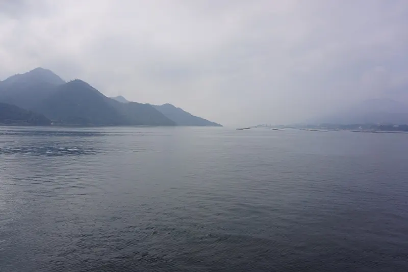Hiroshima Bay, the wide western reach of the Seto Inland Sea, seen in the haze that settles over the water for much of the year.