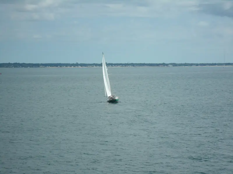 A sailboat crossing Vineyard Sound, the shoal-strewn water between Martha's Vineyard and Cape Cod.