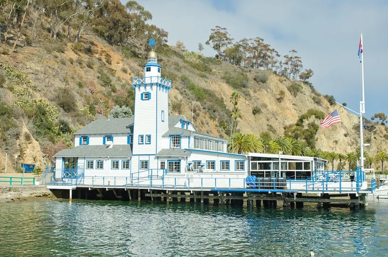 The Catalina Island Yacht Club's clubhouse on the Avalon waterfront, built out over the water on pilings.