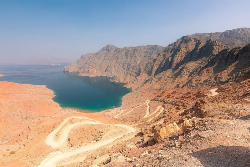 An inlet cut into the Musandam mountains from above, showing the drowned river valleys that give the coast its fjord like shape.