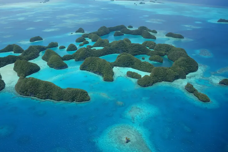 Ngerukewid, 37 raised coral islands set aside as a wildlife preserve since 1956: landing is against the rules here, and the aerial view is how most yachts will ever see it.