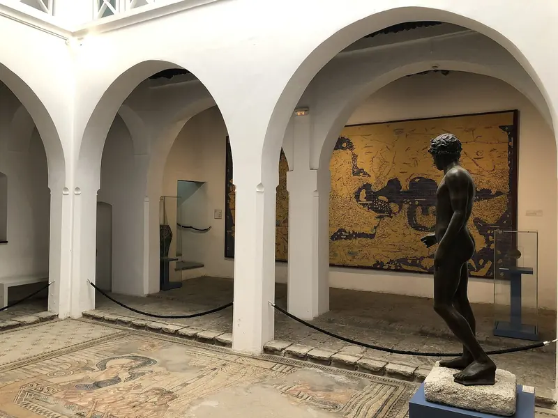 Roman mosaics and statuary inside the Kasbah Museum of Mediterranean Cultures, housed in the former sultan's palace at the top of the medina.