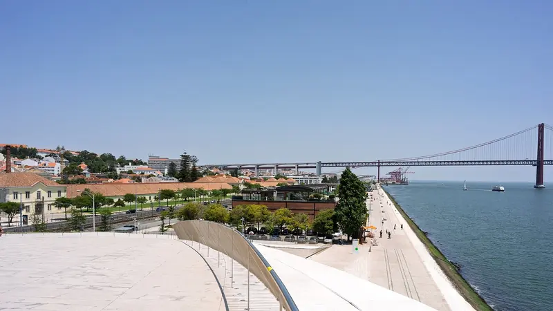 The Tagus at Lisbon under the 25 de Abril bridge, a great natural harbour that still berths large yachts at Cascais rather than in the city.