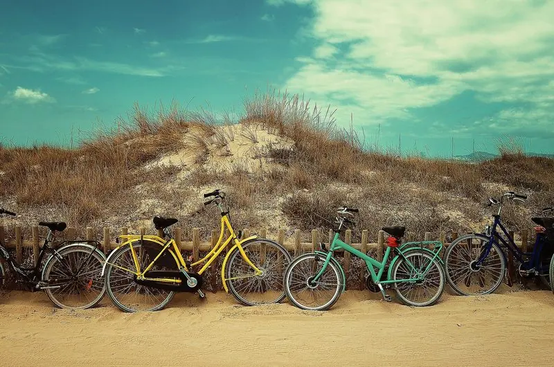Bicycles at the dunes on Formentera, where guests get around without a car.