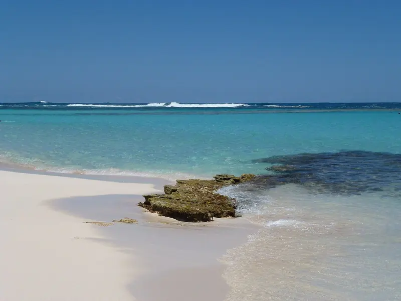 Loblolly Bay on Anegada, where the fringing reef breaks offshore and the water inside it runs from clear to deep blue.