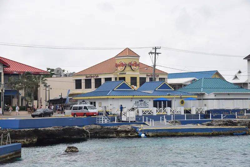 The George Town waterfront on Grand Cayman, where tender boats and cruise passengers land steps from the harbourfront shops.