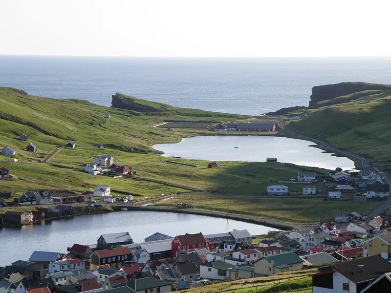 The village of Vagur on Suduroy, the southernmost of the main islands, with the east and west coasts visible from the same ridge.