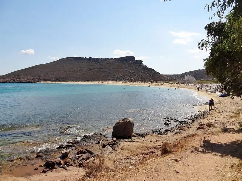 A sheltered bay with a beach, the kind of stop a tender runs guests into.