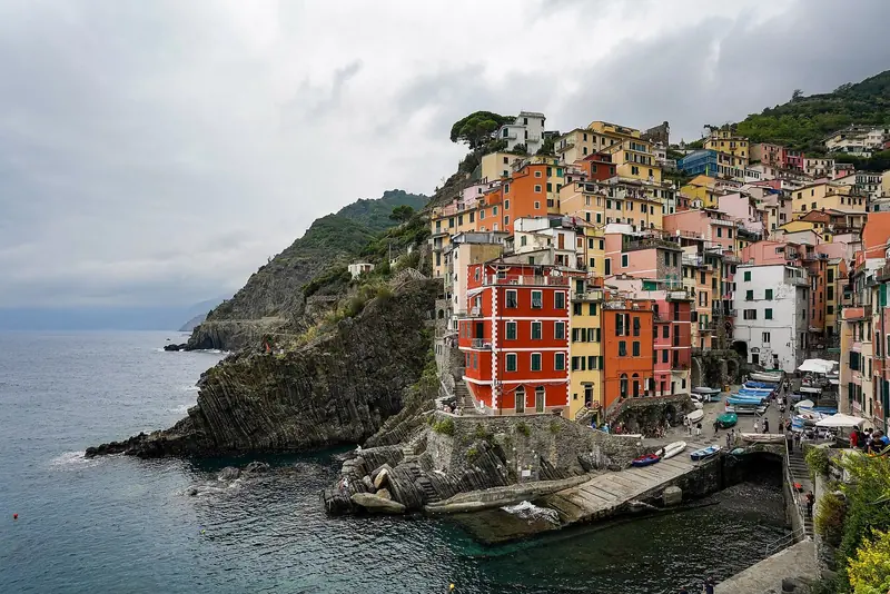 Riomaggiore, the first of the Cinque Terre villages, built into a cleft with a harbour that is a slipway and a few metres of stone.