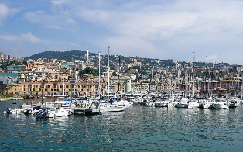 The old harbour at Genoa, a working superyacht port as well as a destination, with the city rising straight off the quays.