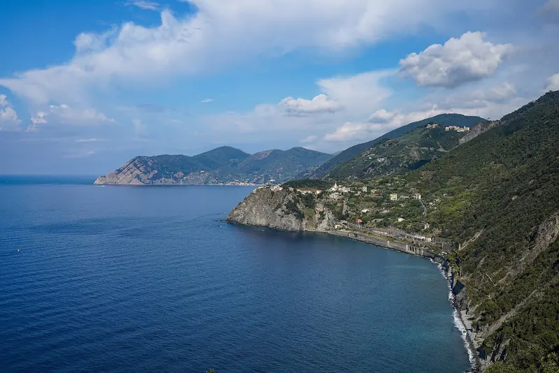 The Cinque Terre coast from above, steep to and almost without shelter, which is why this is a cruise between harbours rather than anchorages.