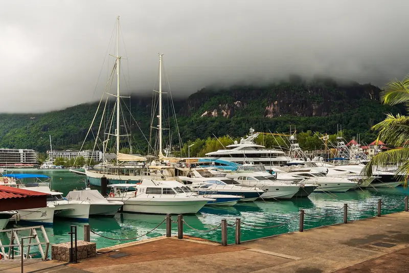 Yachts on the pontoons at the Seychelles' only marina of consequence, whose berths take 120 metres and whose approach channel takes 5.1.