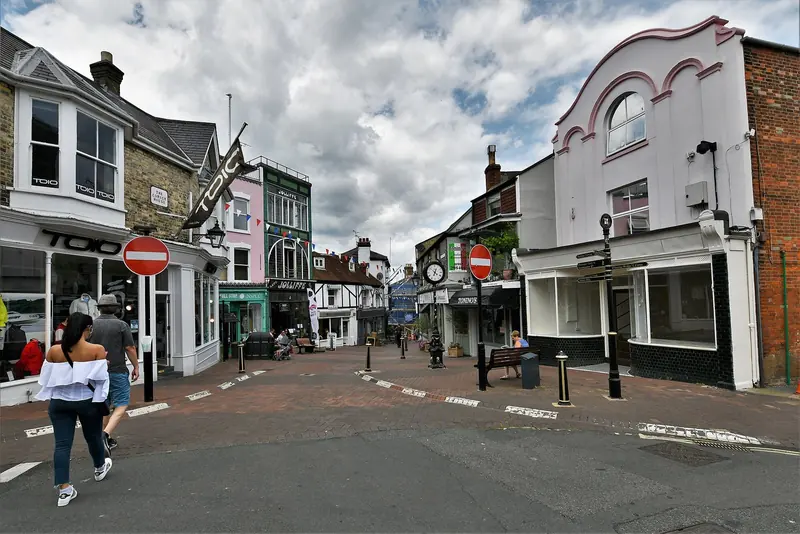 Cowes high street, chandleries and sailmakers rather than resort shops, in a town that exists for the water in front of it.