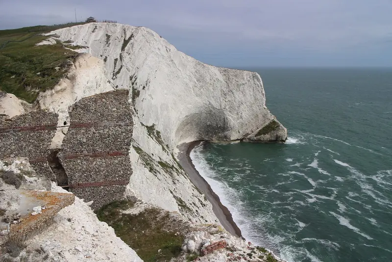 Chalk cliffs on the seaward side of the Isle of Wight, the barrier that shelters twenty miles of water from the Channel swell.
