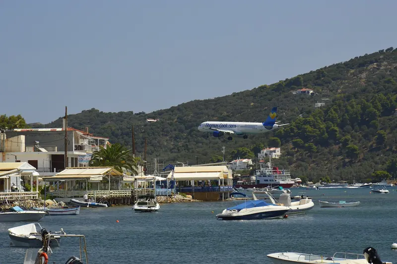 A wider view of Skiathos town and its double harbour, split by the islet of Bourtzi.