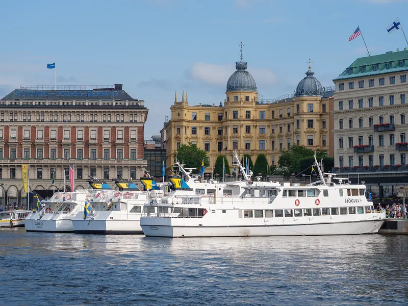 Archipelago boats along the central Stockholm quay, where large yachts lie by arrangement with the port in front of the city.