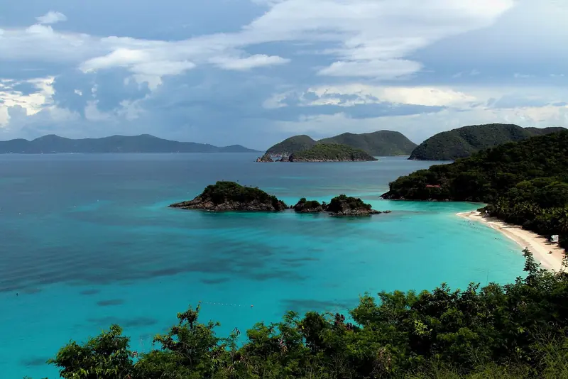 Trunk Bay, St John, from the overlook above it: the beach and the underwater snorkel trail that anchor Virgin Islands National Park's reputation