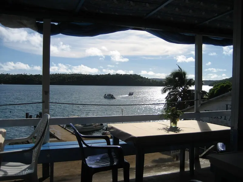 Tenders cross the harbour below the Bounty Bar in Neiafu, a vantage point cruisers have used for decades to watch the anchorage.