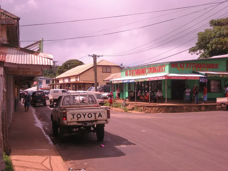A pickup truck works its way down Neiafu's main street past the wholesale stores, the small town that serves as Vava'u's only real provisioning stop.