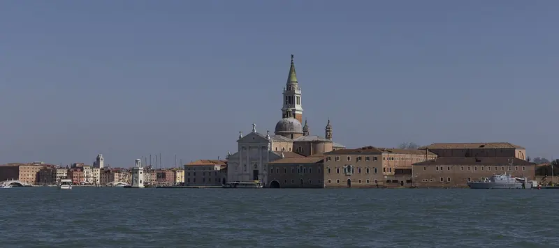 San Giorgio Maggiore seen across the Giudecca Canal, the deep water where large vessels once passed close to St Mark's Basin before the 2021 ban moved anything over 180 metres out of the historic centre.