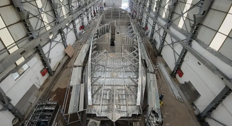 The GX42's bare aluminium hull inside SES Yachts' construction shed in Tuzla, near Istanbul, before the superstructure went on.