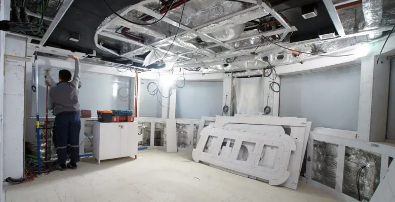 The master suite mid fit-out in early 2026, with wiring and insulation still exposed - the yacht was still months from her summer 2026 delivery at this stage.