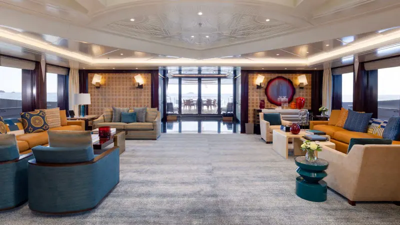 The art deco double-height main saloon, built around a 350kg chandelier and a grand piano, is the room BOAT International's charter editor Georgia Boscawen singled out as defining Whisper's scale.