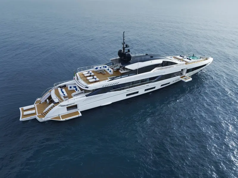 Betsy's beach club and fold-down side hatches, a GranSport 54 signature, open the transom directly onto the water.