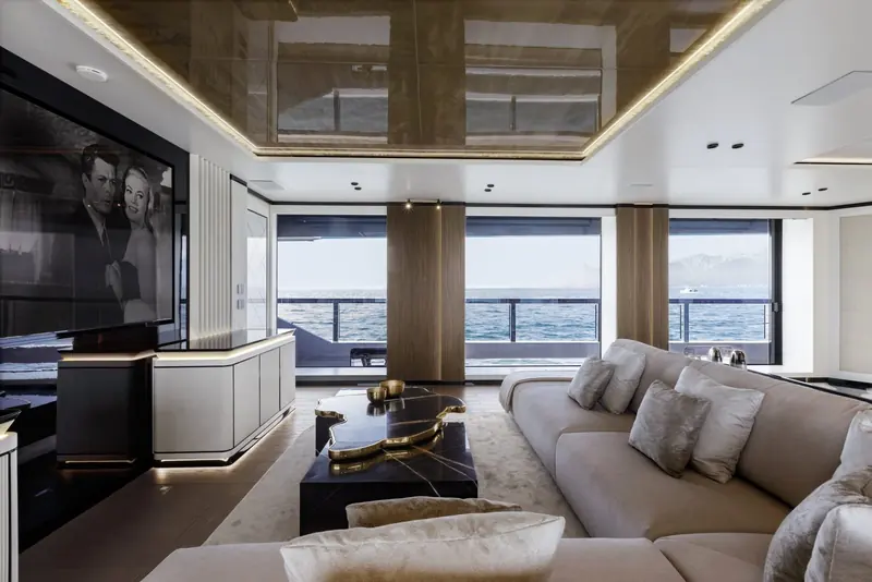 The main saloon on a Mangusta GranSport 54, finished in Mancini's contemporary, neutral palette across all five delivered hulls.