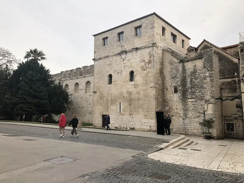 Inside the palace precinct. Split is a Roman city with a marina in it, not a marina with a town attached.