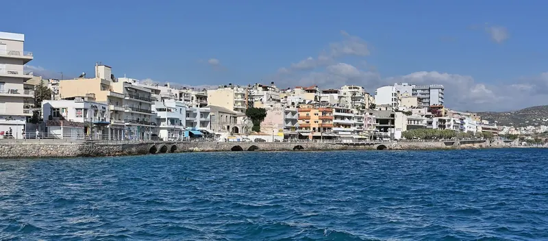 The Agios Nikolaos waterfront, seen from the water.