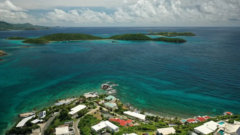 The reef-fringed coastline east of Red Hook, small boats anchored off Cas Cay and Shark Island, on St Thomas's East End near the marina.