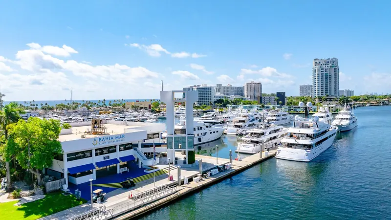 The Bahia Mar control building on Seabreeze Boulevard, with the parallel dock and megayacht berths running out behind it toward the Intracoastal