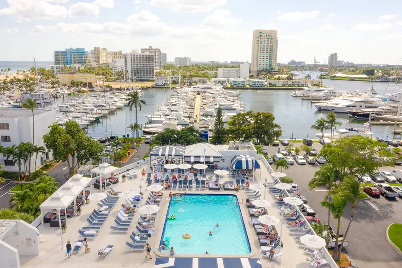 The resort's pool deck overlooking the marina basin, the amenity side of a facility built as a yachting center and a beach resort together